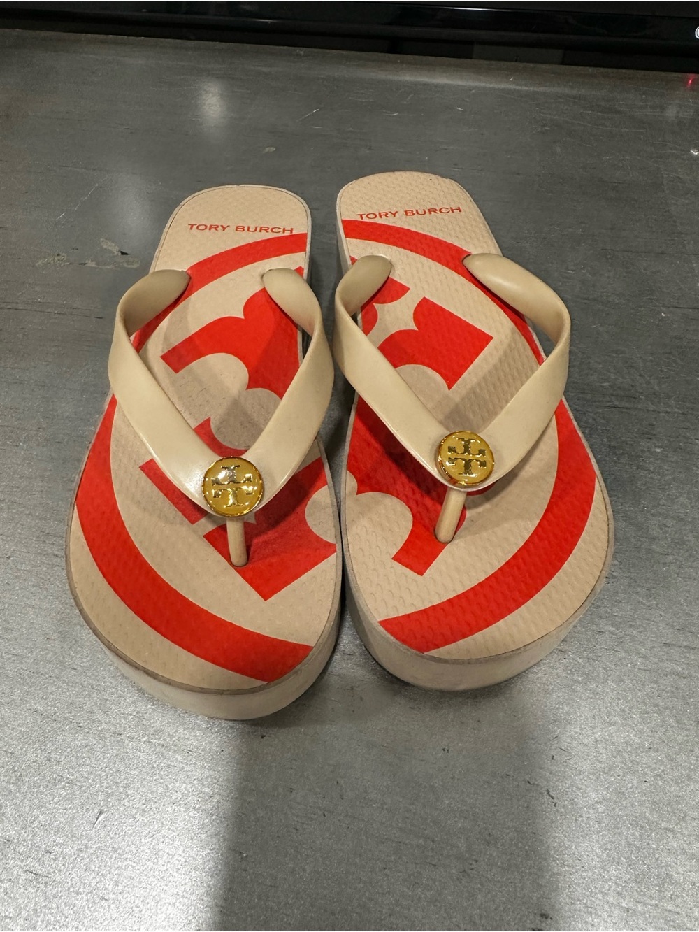Tory Burch Beige Flip Flop Sandals with Red Footbed Logo